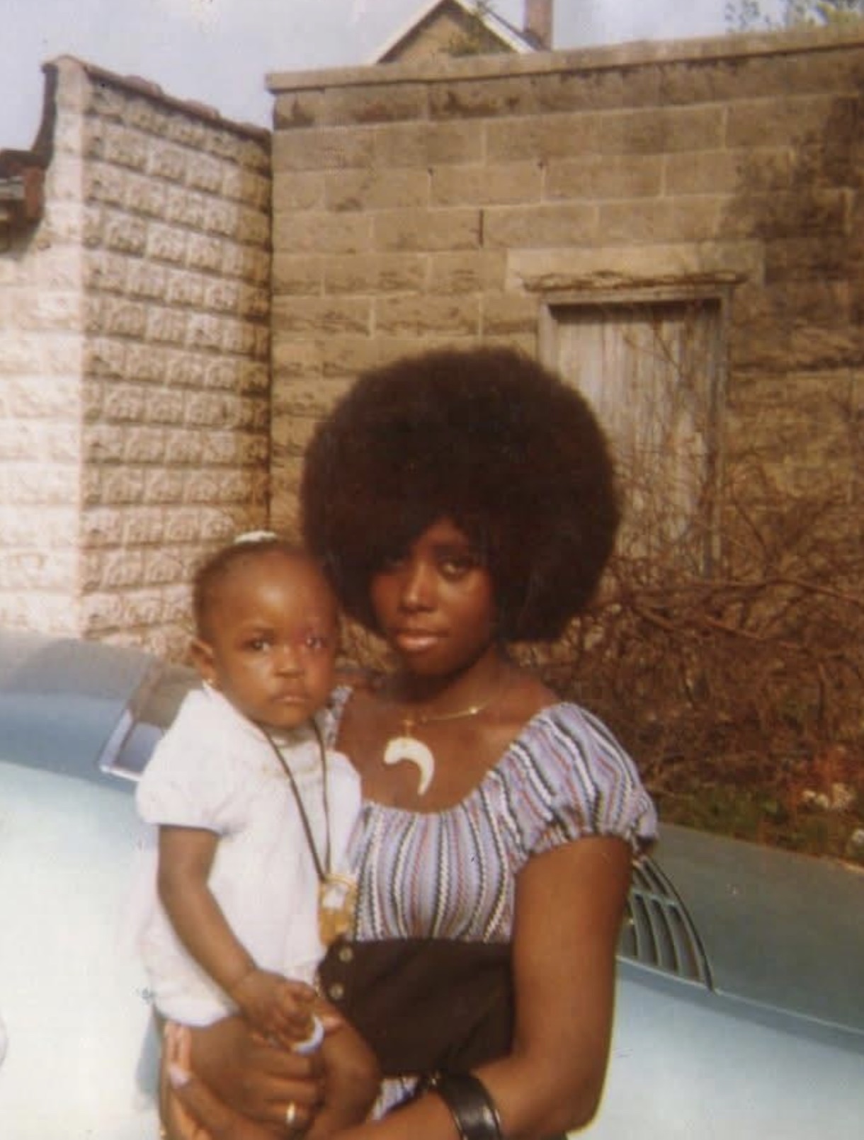 My grandmother with my mother in the early 1970s. My grandma had a pretty sweet fro! 